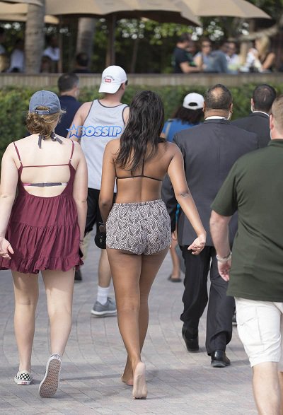 Sasha Obama spends time on the beach in Miami after missing her fathers farewell speech.